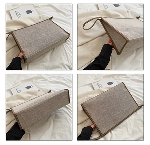Gros plan du tissu en toile et des finitions en cuir marron sur le grand sac de bureau