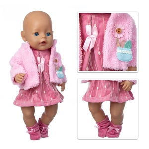 Detail of pink floral doll cardigan and polka dot dress for 18 inch dolls