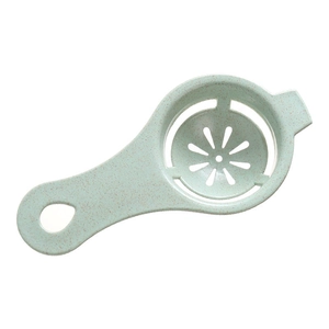 Mini plastic egg white separator in light blue green with a speckled matte texture