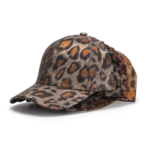 Three metallic leopard print baseball caps in gold, bronze and brown tones