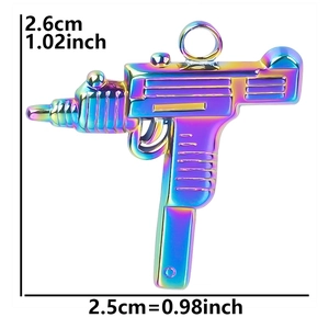 Detail shot of mini submachine gun pendant with rainbow plating and size dimensions