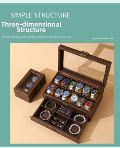 Detail of a two-tier walnut wood watch box with 12 slots and a jewelry drawer