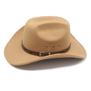 Detail of camel wool cowboy hat featuring a leather band with longhorn patterns and vents