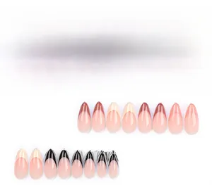 Detail of almond-shaped press-on nails with nude base and burgundy black French tips