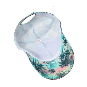 Detail of tropical palm tree print baseball cap with breathable white mesh and adjustable strap