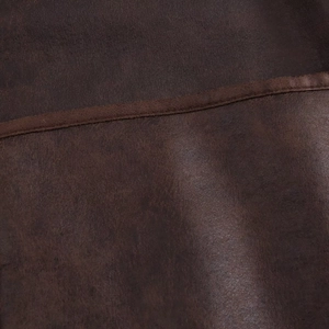 Macro detail of dark brown faux leather texture with reinforced fine stitching craftsmanship