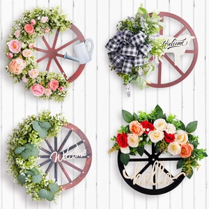Christmas door wreath collection with wooden wheels, buffalo plaid bows and flowers