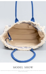 Detail of bohemian canvas tote interior featuring zipper pocket and white fringe trim