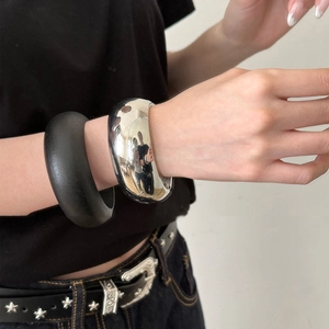 Polished silver and matte black wide metal bracelets set for minimalist women fashion