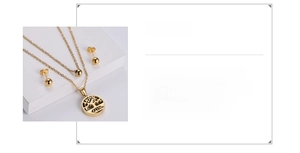 Close-up of 18k gold plated stainless steel Tree of Life pendant with matching ball earrings