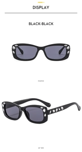 Detail of square sunglasses featuring crystal rhinestones on black frames and temples