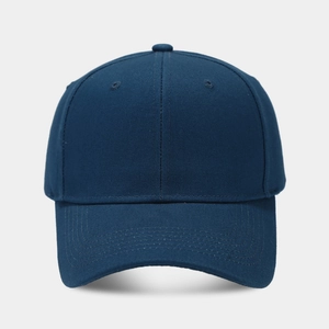 Detailed close-up of a navy blue structured cotton twill baseball cap with reinforced stitching