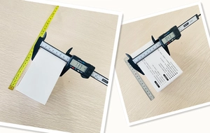 Detailed size measurement showing 73.7mm width and 84.1mm length of the white baby sippy cup