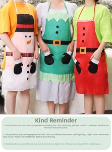 Detailed view of Christmas themed aprons featuring Santa and Elf holiday designs
