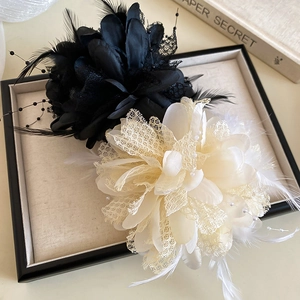 Elegant floral hair claw clips with lace and feathers in black and cream white
