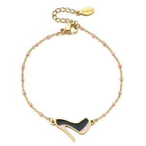 Close-up of stainless steel lobster clasp and S.Steel tag on pink bead bracelet