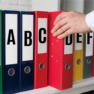 Close-up of waterproof alphabet stickers for labeling office folders and organizers