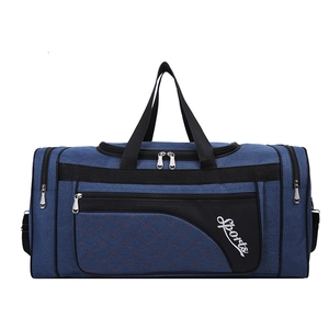 Front view of large capacity blue Oxford travel bag with quilted diamond pattern