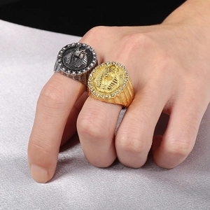 Detailed view of Egyptian Pharaoh rings with crystals on hand in gold and silver finish