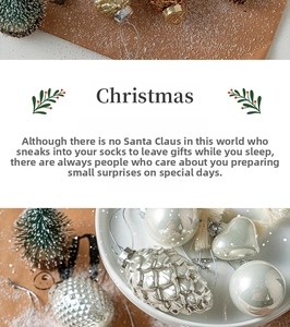 Silver Christmas ornaments with pine cone and ball shapes on a festive snow background