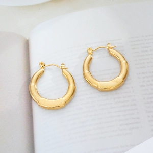 Modern 18K gold plated titanium steel hoop earrings with unique bamboo textured design