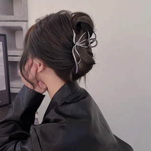 Large silver butterfly metal hair claw clip for thick hair shown on model updo