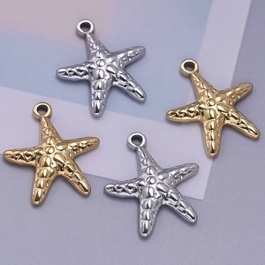 Detailed close-up of 304 stainless steel starfish pendants in gold and silver finishes