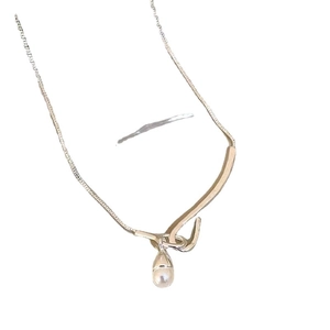 Elegant S925 sterling silver necklace featuring a teardrop freshwater pearl pendant on white