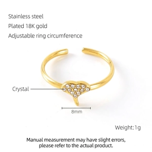 Detailed view of 8mm heart-shaped 18K gold plated stainless steel adjustable ring with crystals