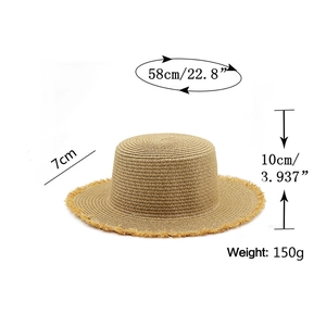 Detailed size specifications for wide brim raffia sun hat with measurements and fringe