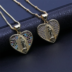Detail of heart-shaped Virgin Mary pendant with colorful micro-inlaid rhinestones