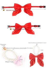 Detail view of adjustable pet collars with pearls and red satin bows for small dogs