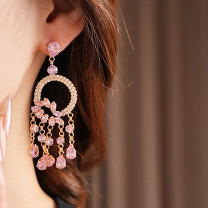 Elegant drop earrings with pink zircons and long tassels in rose gold finish