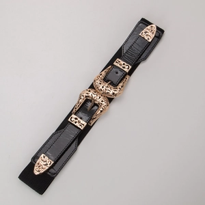 Vintage black wide elastic waist belt for women with double ornate gold floral buckles
