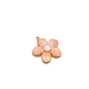 Detail of pink enamel flower pendant in stainless steel with a central pearl inlay