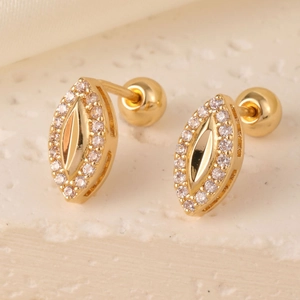 Macro view of gold marquise studs with zircon paving and screw back closure