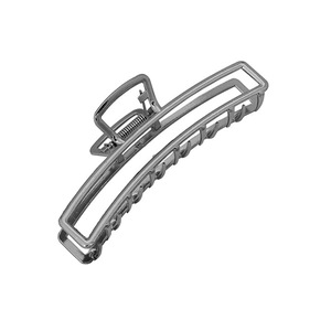 Macro view of silver geometric hollow metal hair claw clip with spring detail
