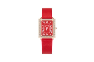 Detail of a square red quartz watch with sparkling rhinestones and a red leather strap