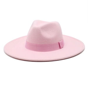 Detailed view of pink wool fedora hat with wide brim and matching grosgrain ribbon bow