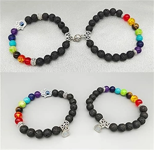 Detail of magnetic heart clasp connecting natural lava stone and chakra bead bracelets