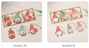 Detailed view of handmade wooden Christmas gnomes in decorative boxes for tree hanging