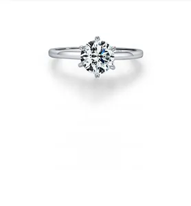 Macro shot of 1 carat moissanite ring showing 6-prong S925 sterling silver stamp
