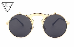 Detail of steampunk flip-up sunglasses with golden metal frame and round grey lenses