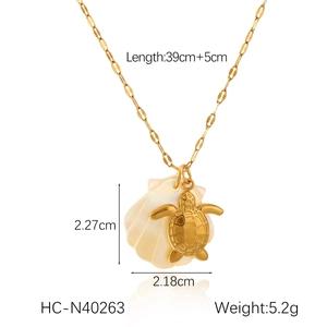 Detailed view of 18K gold starfish and seashell pendant with size and weight specs