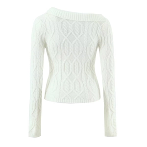 Detailed view of the off-shoulder cable knit texture and ribbed cuffs on the white sweater