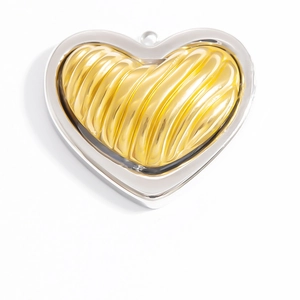 Polished stainless steel heart pendant featuring a gold textured center and silver frame