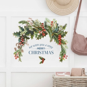 Christmas wall decal featuring a holly berry wreath with Merry Christmas festive text