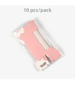 Flat lay of 10-piece pack pink and white foldable PVC gift boxes in simple packaging