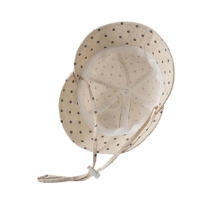 Baby cotton wide brim bucket hat with gray polka dots and adjustable chin strap