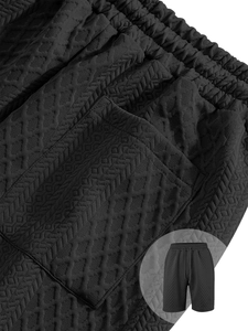 Detailed macro view of black waffle texture fabric and drawstring waist on men shorts